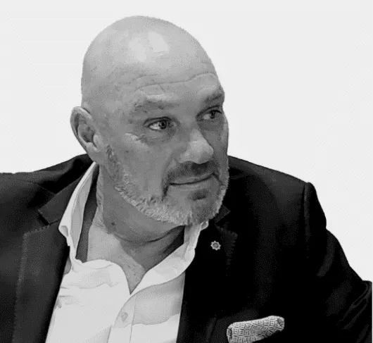 Mick Field, Senior Operations Manager at Sectech, photographed in a dark suit